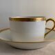 12 coffee cups and 12 white porcelain cups of Gold Gold Limoges