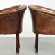 Ensemble de deux fauteuils en peau de mouton / fauteuils tubulaires avec une belle patine.