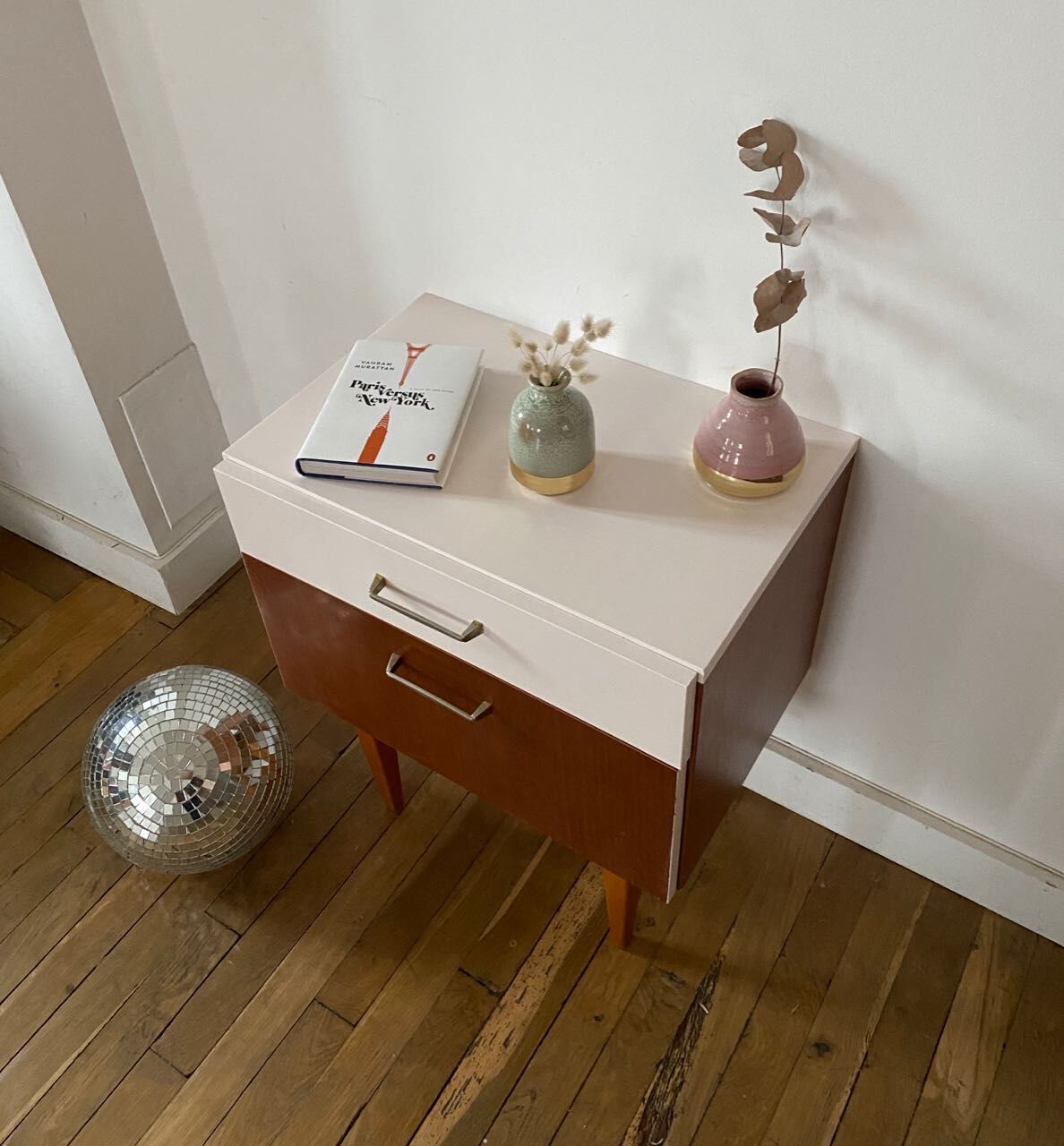 Wooden bedside table and nude