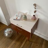 Wooden bedside table and nude