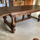 Old dining table with parquet floors