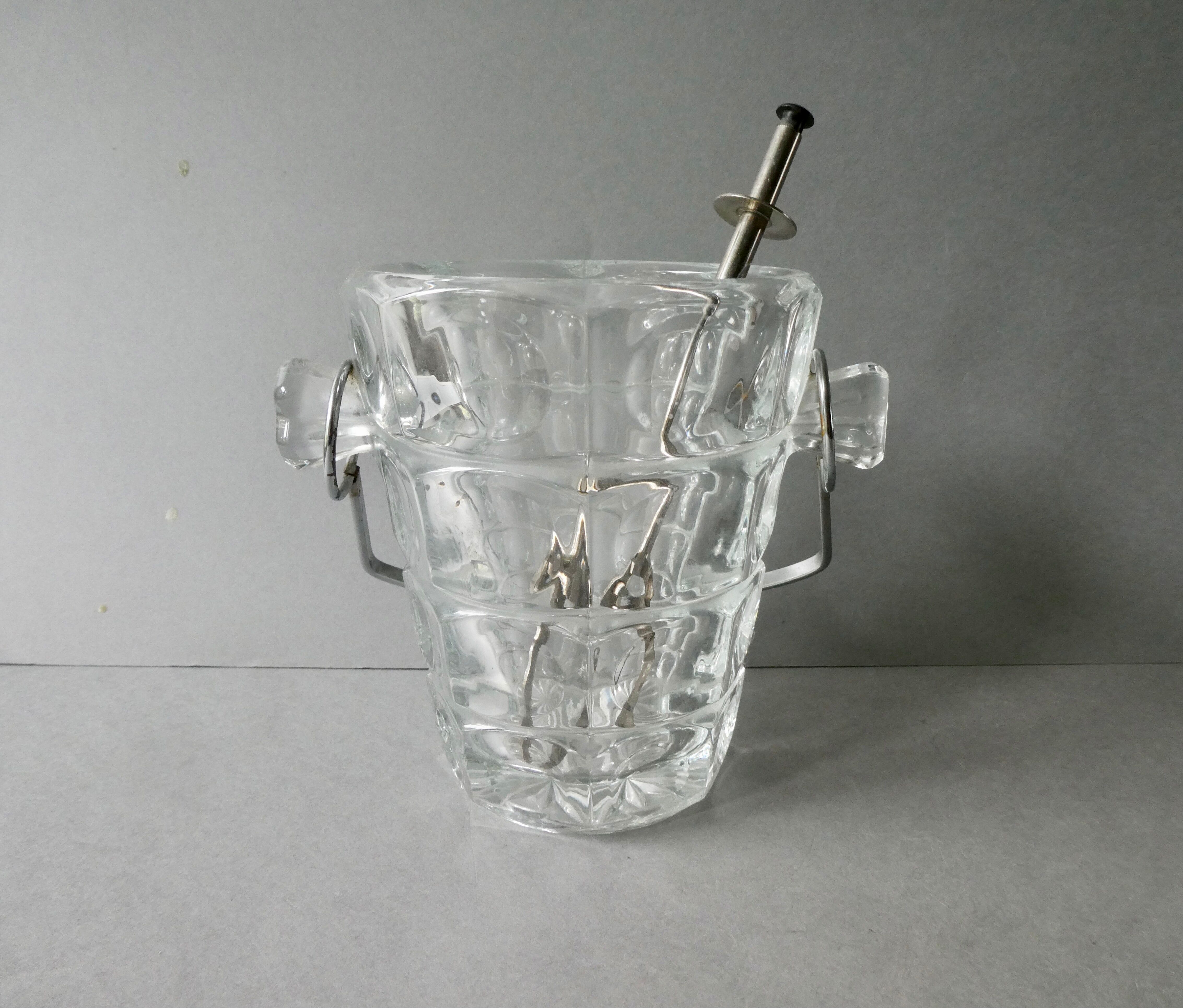 Cut glass ice bucket and its pliers