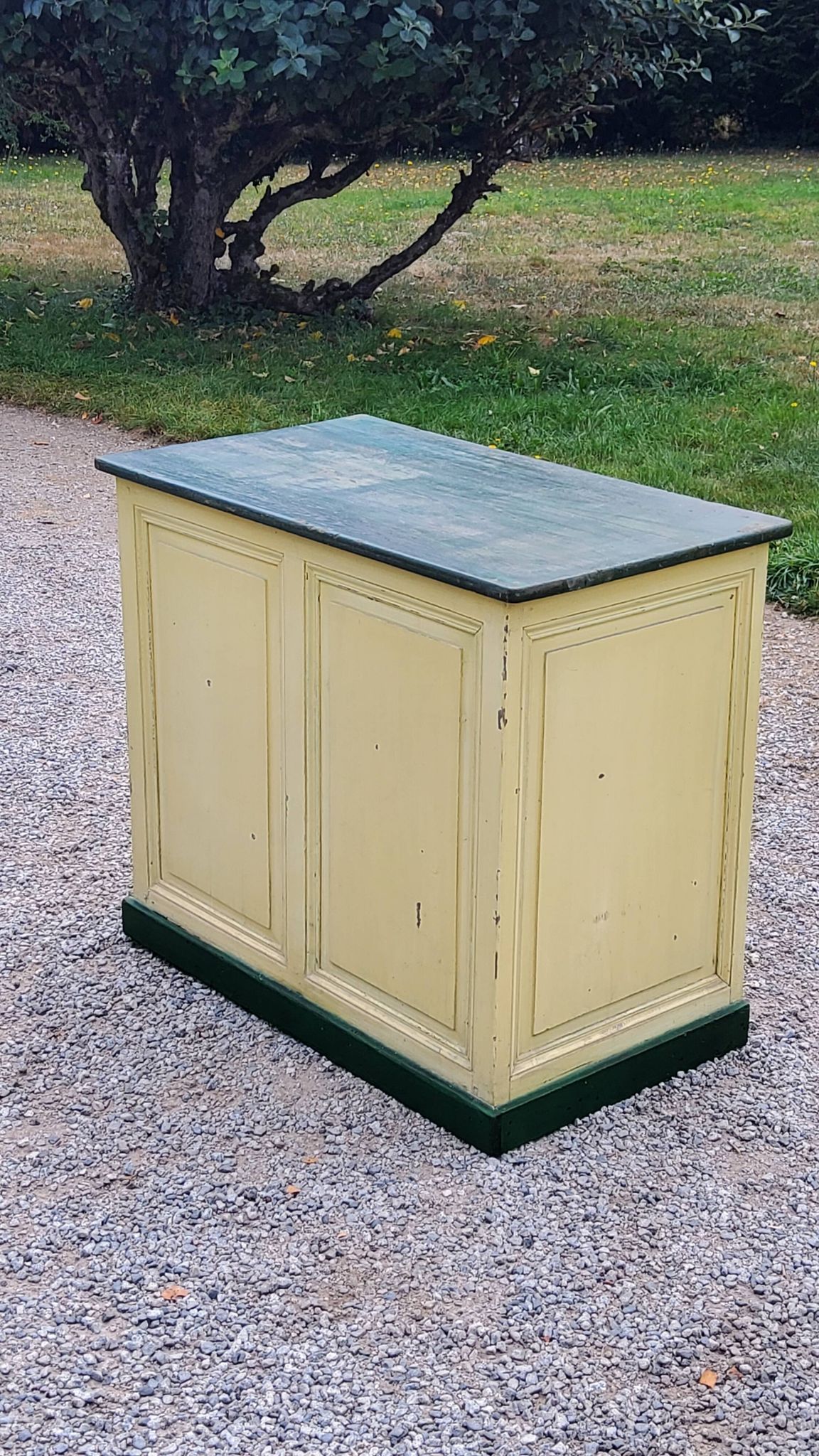 Late 19th century grocery counter in green and yellow patina painted wood