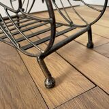 Butterfly magazine rack in patinated metal