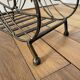 Butterfly magazine rack in patinated metal