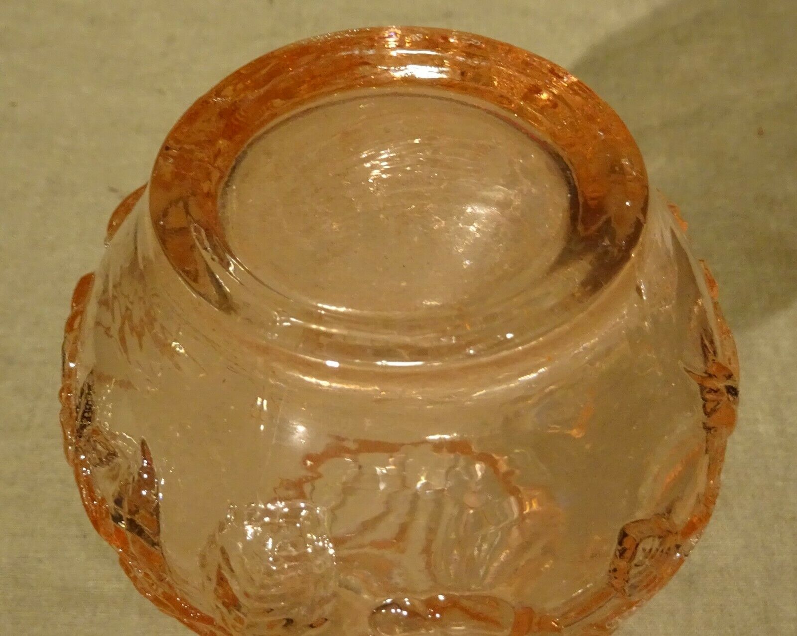 Pink molded pressed glass vase decorated with hazel foliage