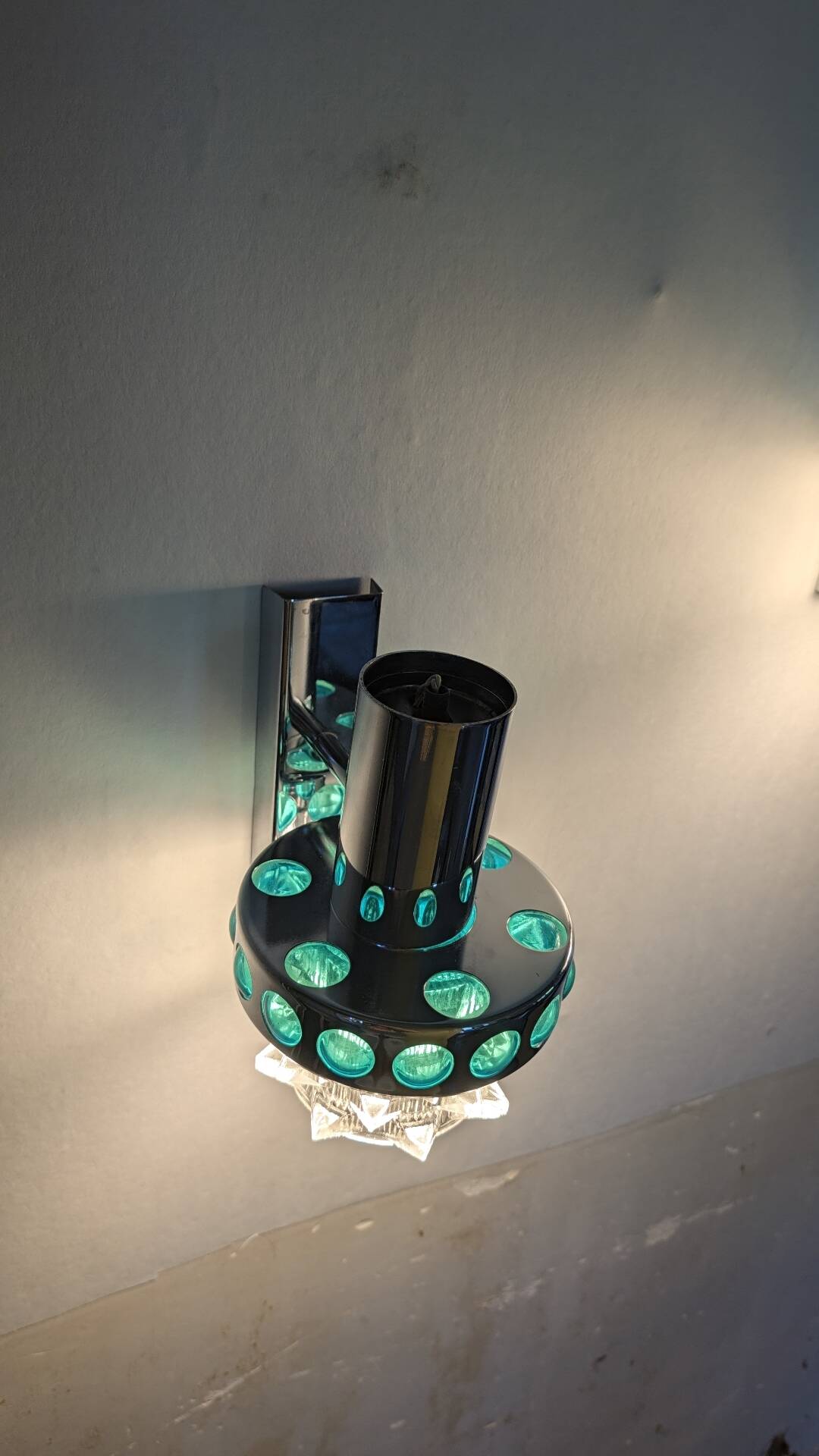 Pair of Space Age wall lights in chrome and green glass, 1970s.