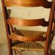 old armchair with leather armrests, from the 19th century