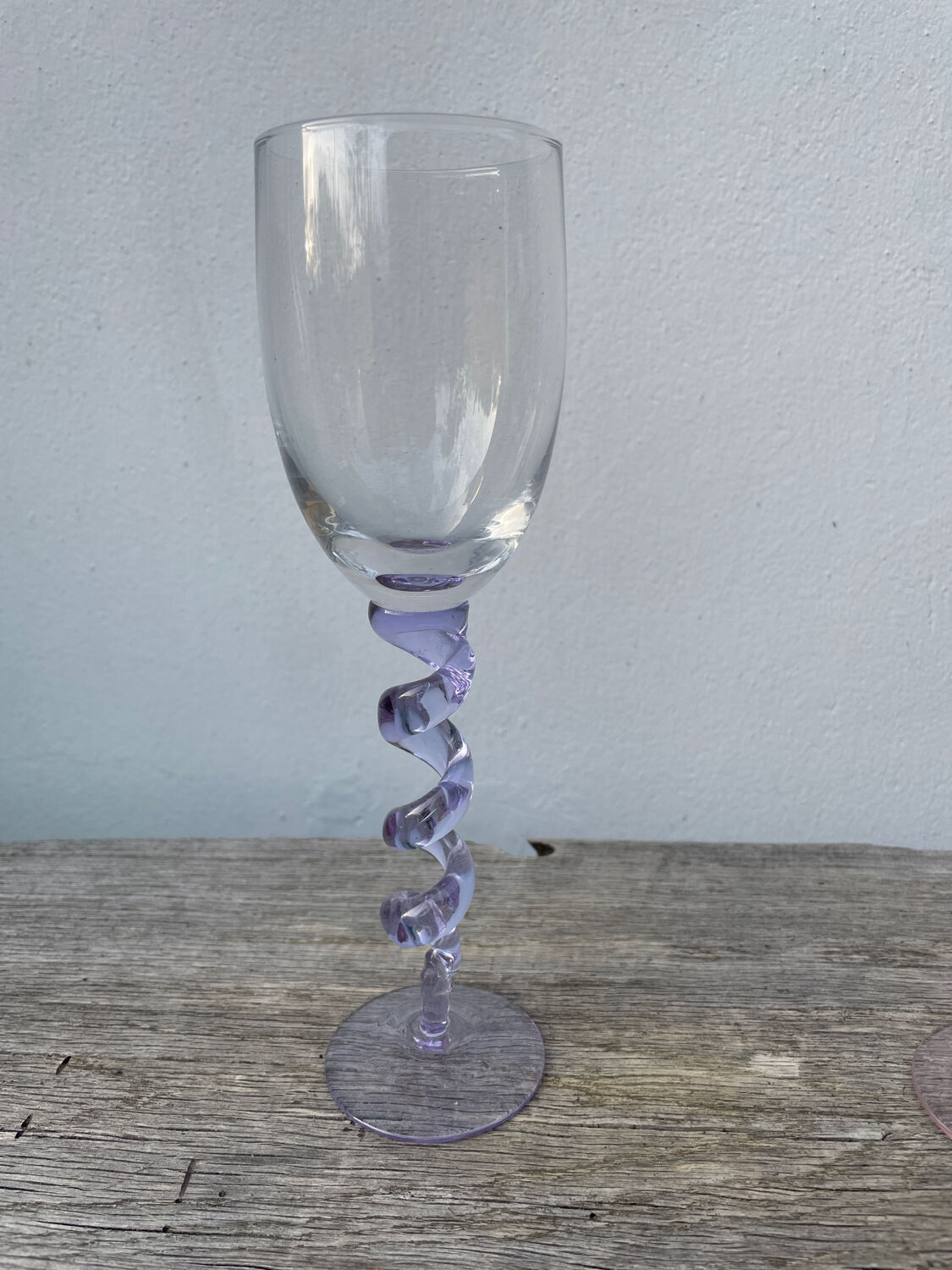 4 large, multicoloured, twisted champagne flutes