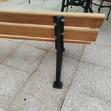 Garden bench with old cast iron legs