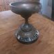 Bronze bowl on marble base