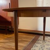 Scandinavian teak table with butterfly extension 60s