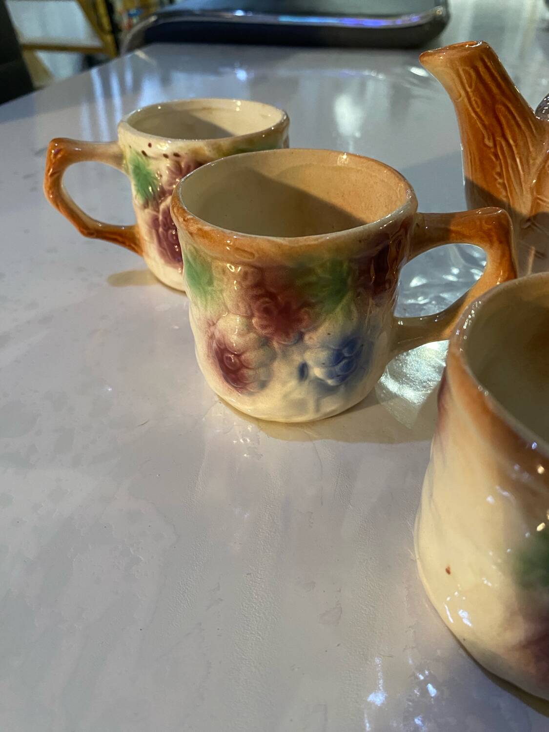 Vintage earthenware teapot and cup set