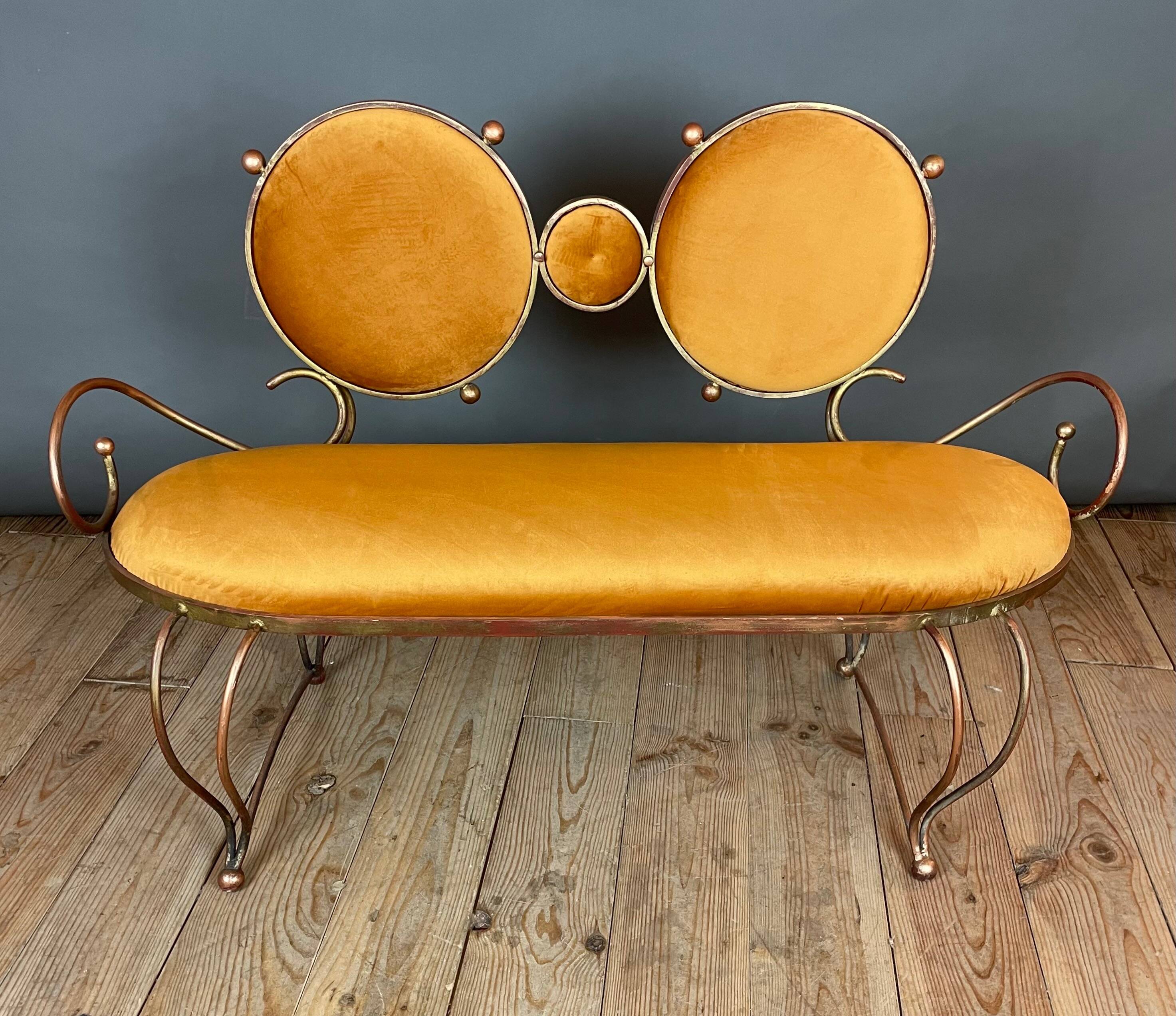 Wrought iron and velvet sofa