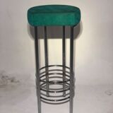 Contemporary aluminum stool and green/blue velvet
