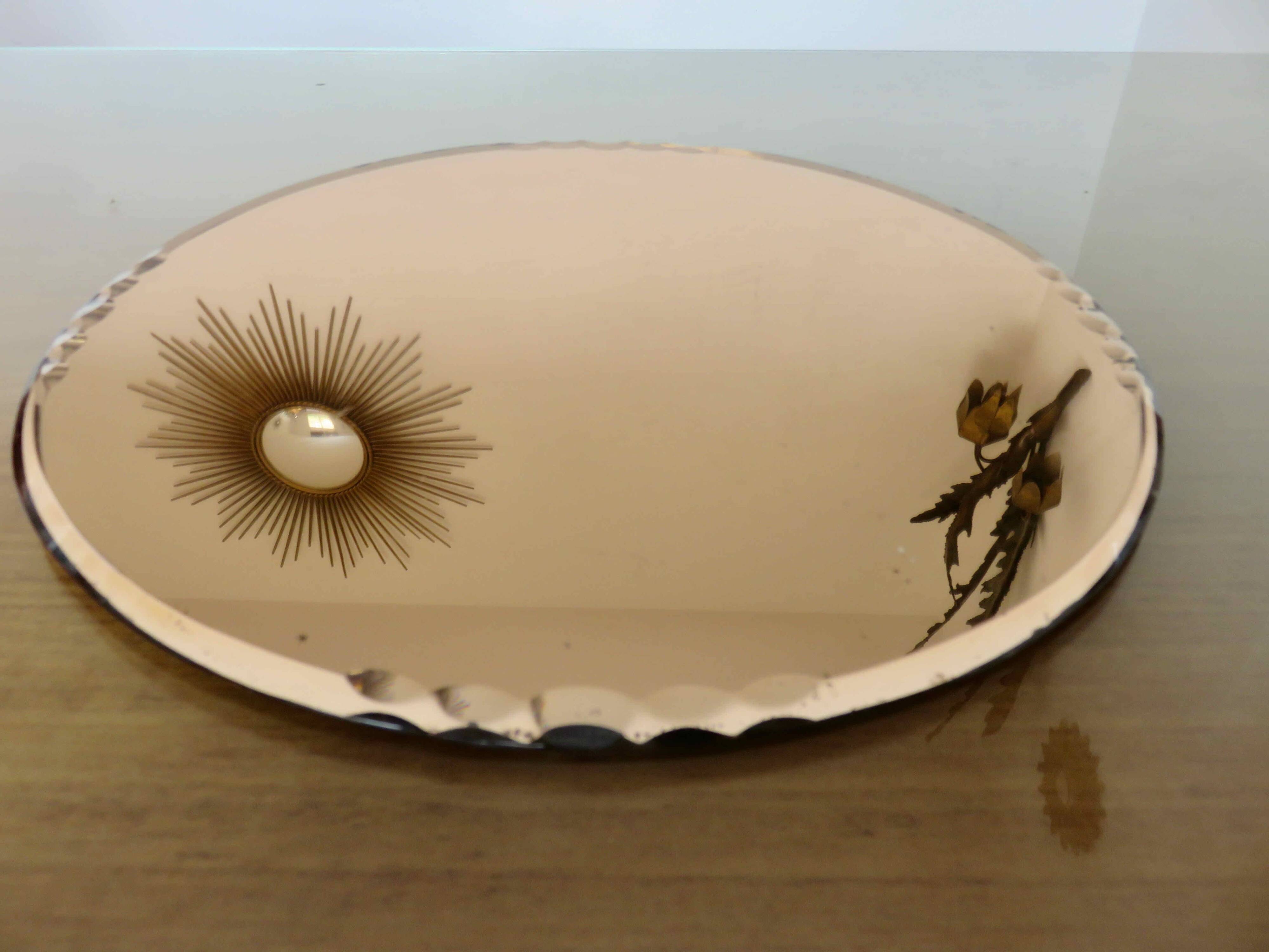 Round beveled amber pink mirror