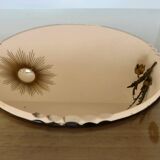 Round beveled amber pink mirror