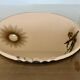 Round beveled amber pink mirror