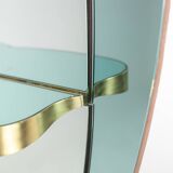 Two-tone glass and gilded brass console mirror. Circa 1950.