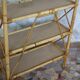 Pair of rattan shelves including a corner shelf