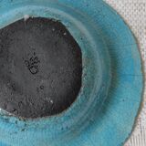Empty turquoise raku pocket