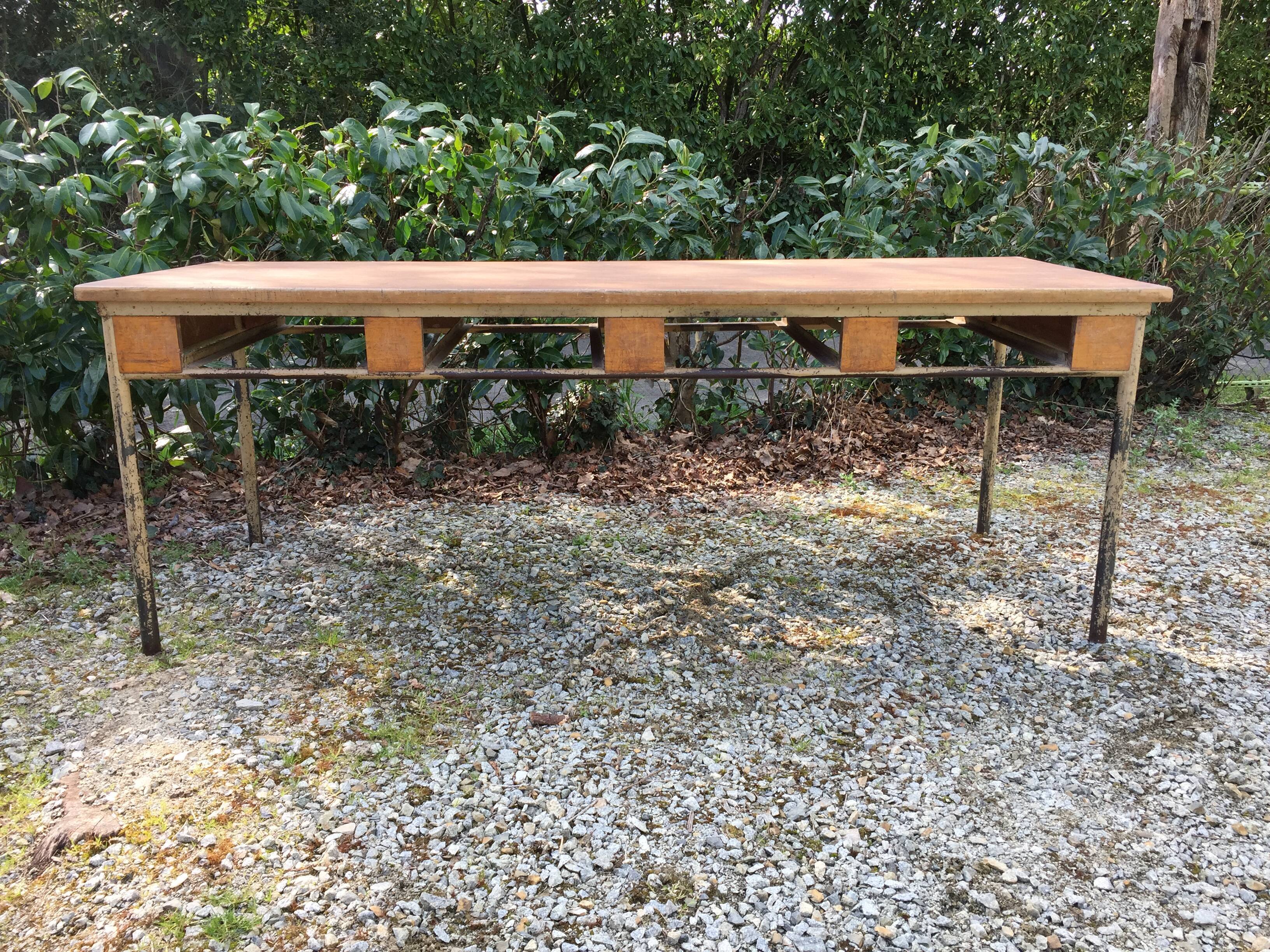 Vintage modernist table with metal tubular base