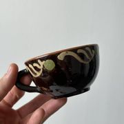 Lot of mismatched Alsatian pottery coffee cups