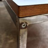 Table basse en mélaminé blanc et acier chromé