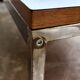 Table basse en mélaminé blanc et acier chromé