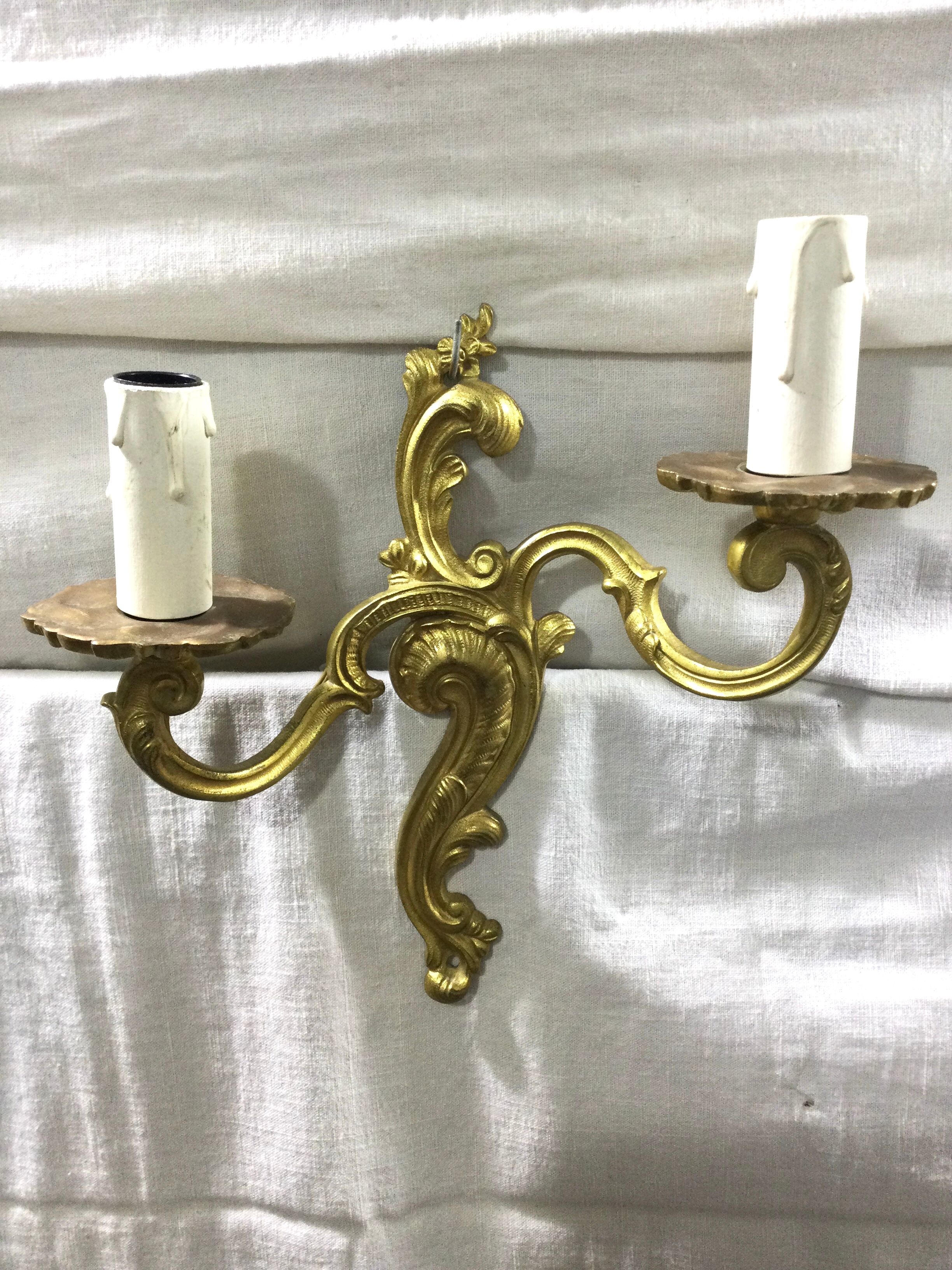 Pair of Louis XV style bronze sconces