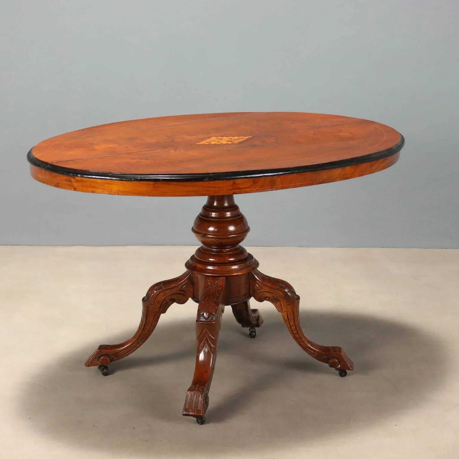 Antique walnut table with marquetry top, United Kingdom, 19th century.