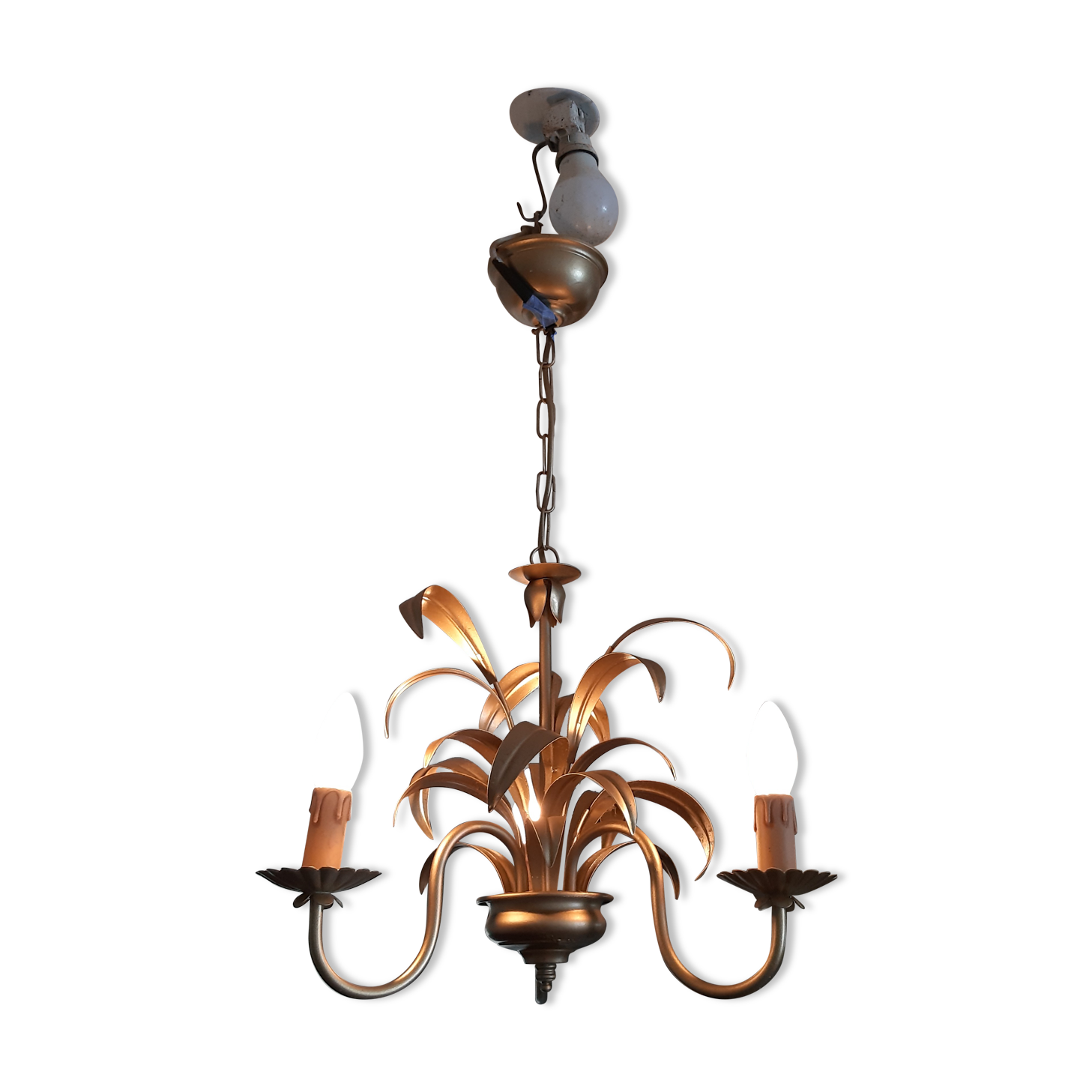 Vintage chandelier in golden metal