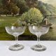 2 antique champagne glasses in engraved glass