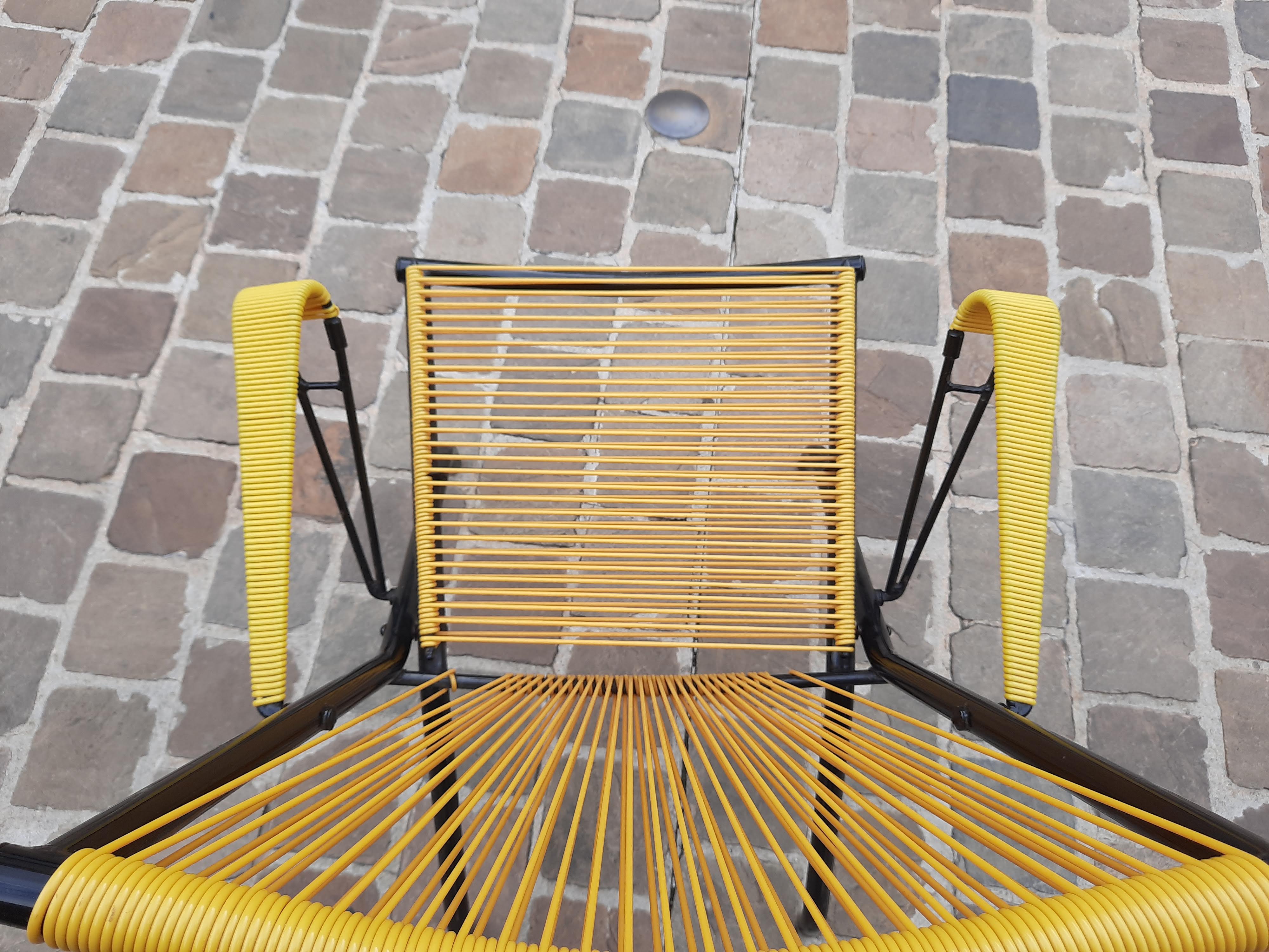 Folding chair in red scoubidou and black metal structure