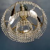 Cascade chandelier with crystal and brass tassels