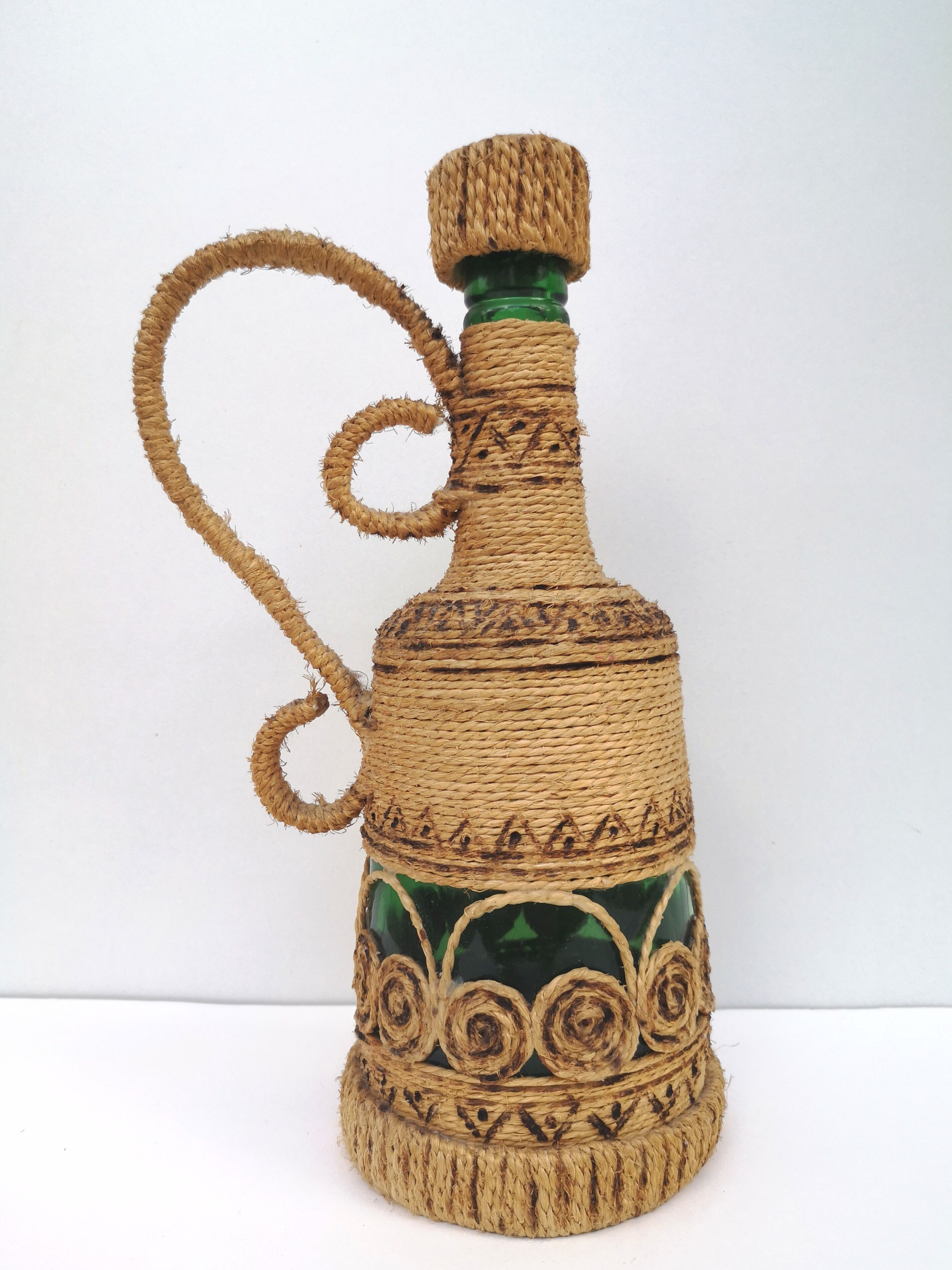 Vintage decorative rope bottle