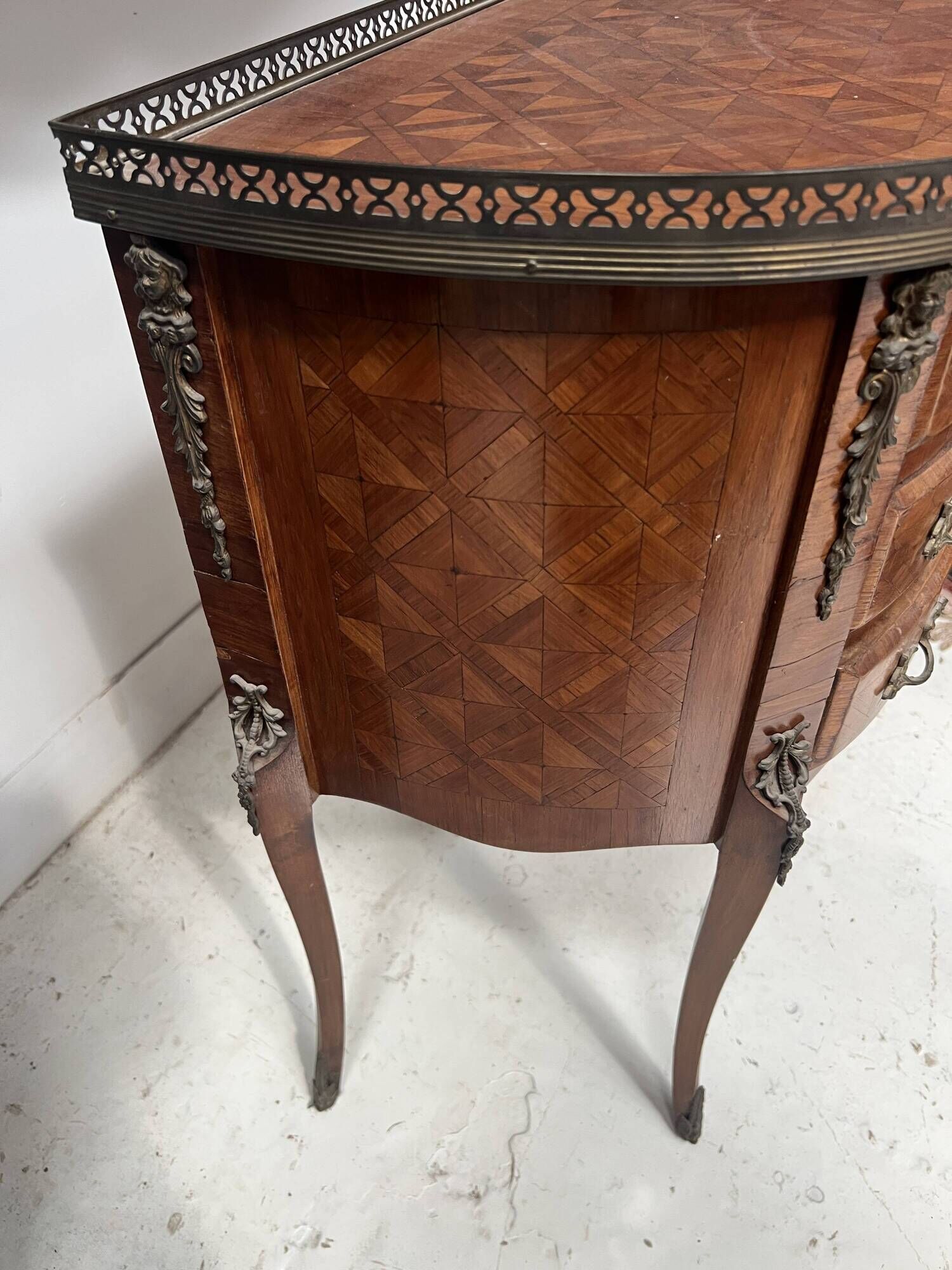 Half-moon commode in Louis XV style with cube marquetry from the 20th century.