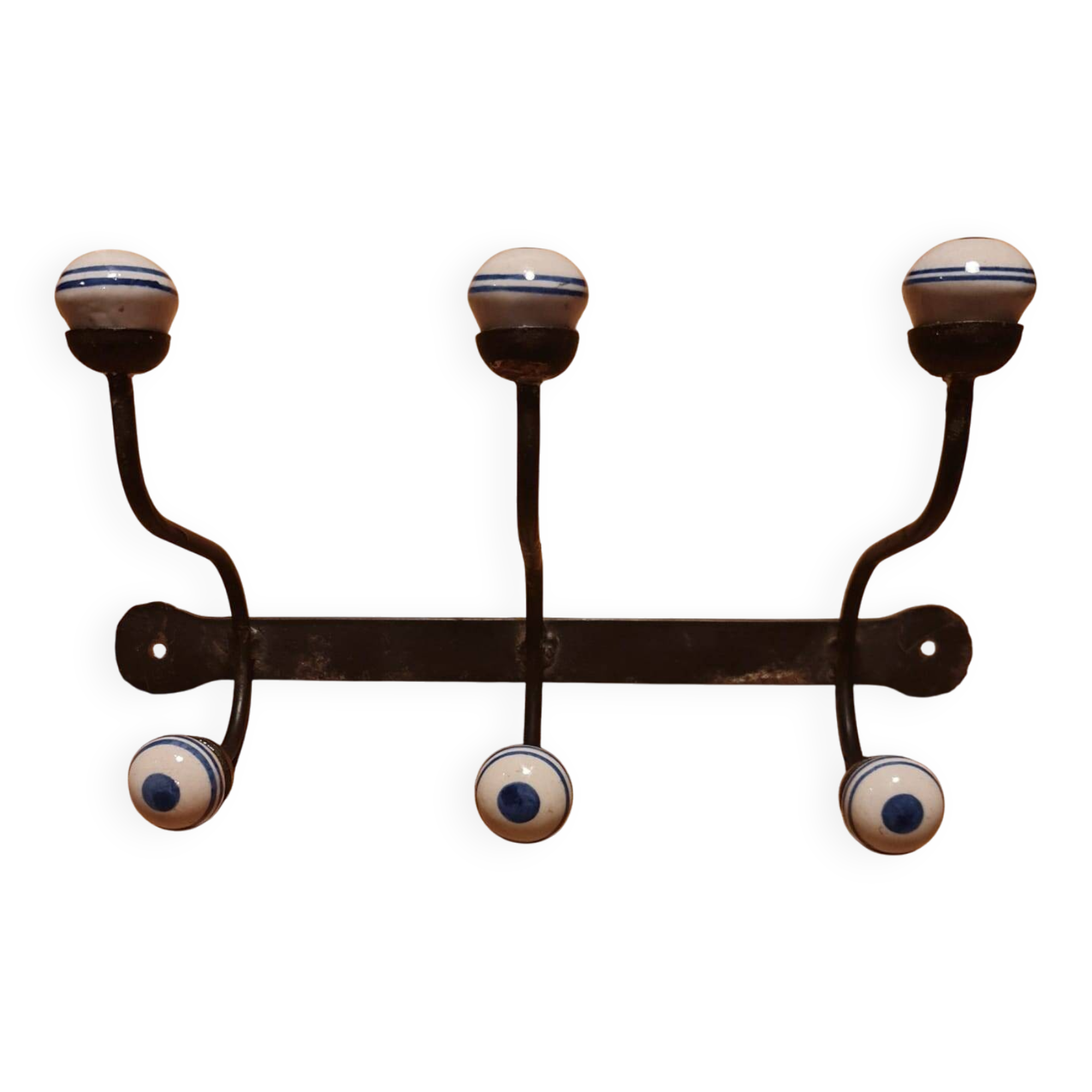 Old iron and porcelain coat hooks