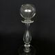 Glass oil lamp blows on foot shower