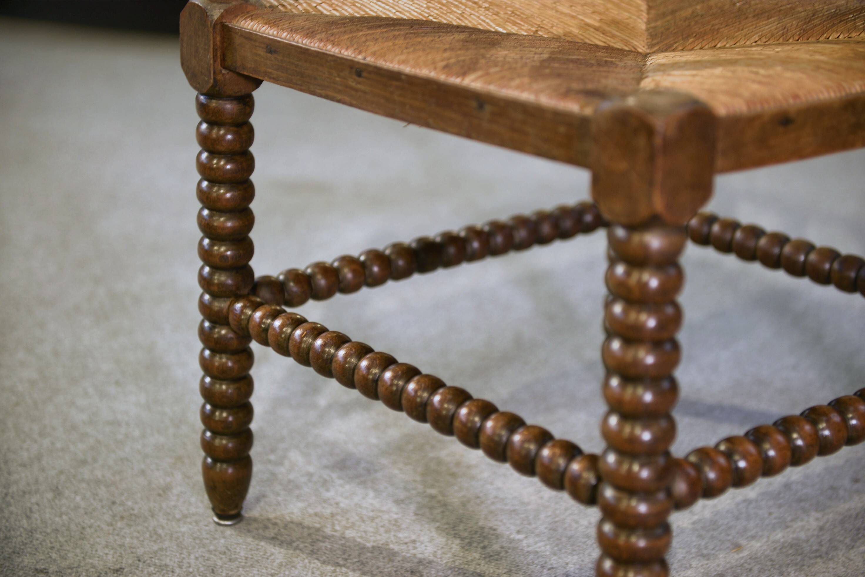 Pair of turned wooden corner chairs from the 1950s.