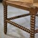Pair of turned wooden corner chairs from the 1950s.