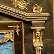 Empire-style fireplace decoration.