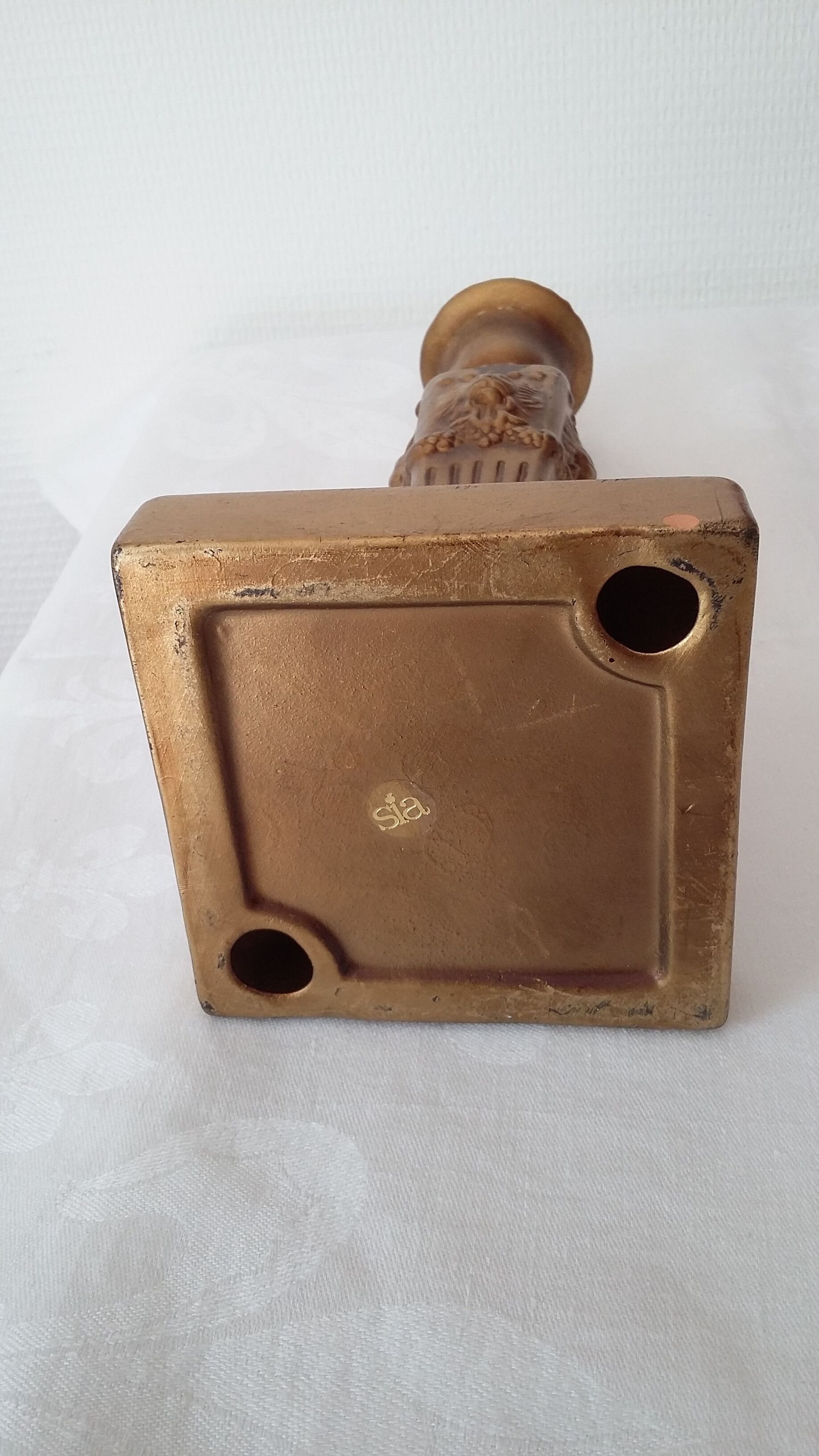 Golden ceramic candleholder