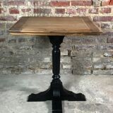 Bistro table in wood black foot and raw top