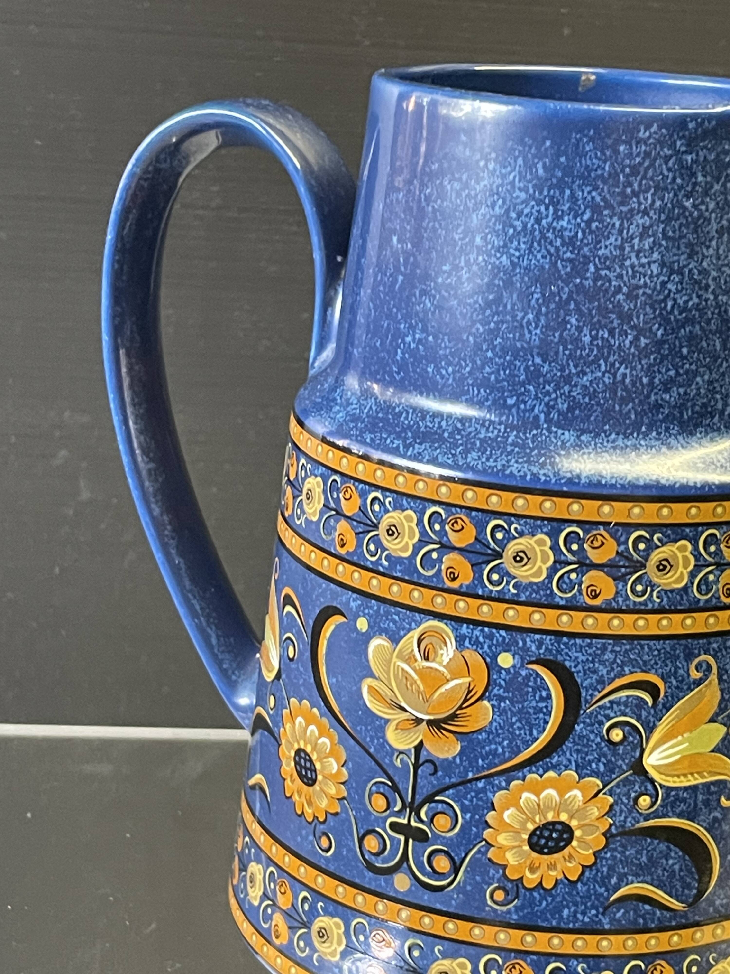 Very nice blue ceramic jug in good condition.