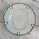 Set of 7 deep plates in earthenware, decorated with a green frieze.