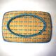 Presentation basket in woven and hand-painted wicker