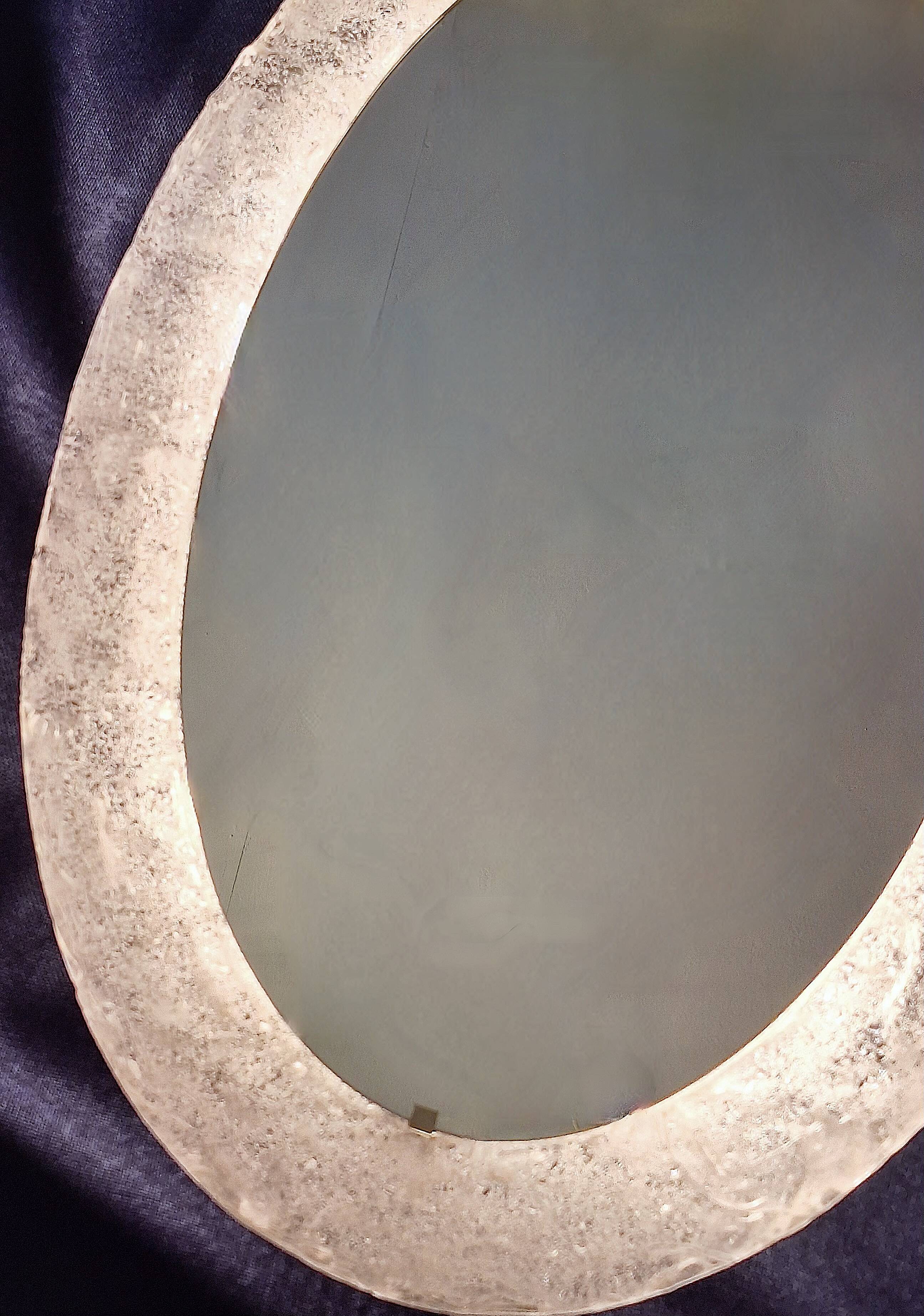 Erco large melted ice acrylic glass illuminated oval wall mirror, 1970s