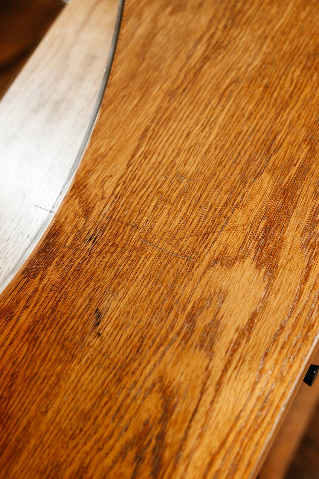 Vintage oak cabinet with circular mirror, 1960s modernist design.