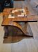 Square coffee table made of marquetry wood.